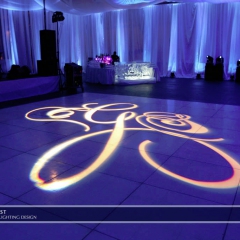 Monogram on dance floor with Winter wonderland wedding lighting