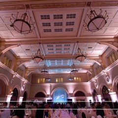 Custom monogram on fabric backdrop and LED uplighting  at Mpls Depot