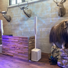 Stacked barn wood DJ booth with EV Evolve speaker system