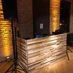 Stacked wood  DJ booth at Solar arts