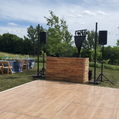 Stacked natural wood DJ booth at Farm Wedding