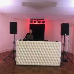 White Tufted leather DJ booth at Calhoun Beach Club