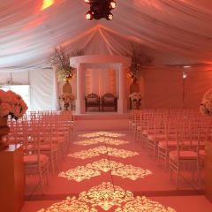 Ceremony damask pattern using 5 lights in tent