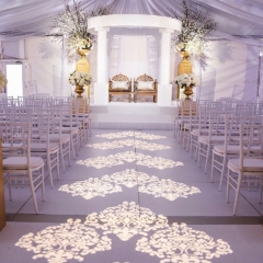 Ceremony damask pattern using 5 lights in tent