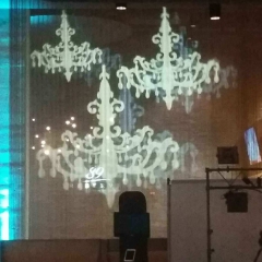 Chandelier image projection onto sheer curtains