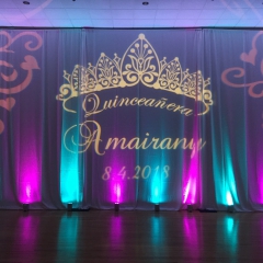 Quinceanera with purple and teal uplighting